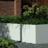 Shrubs and plants displayed outdoors in a white Aluminium planter